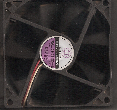 This is a common PC cooling fan. As you can see it is dirty, filled and caked with dust. The cooling fan provides cooling to the electrical components of the motherboard and power supply. As the blades of the fan become dirty or, fan vents get blocked, it reduces the volume of air needed to pass over the heat-sinks of essential electronic components and can cause an increase in temperature of that particular electronic component. Heated electronic components or semiconductors cause resistance and therefore a larger drain on the power supply to produce (regulate) more current to adjacent components which could cause a thermal runaway, potentialy damaging sensitive electronic components like a micro-processor.